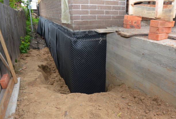 Happy homeowners after waterproofing job in Broadview